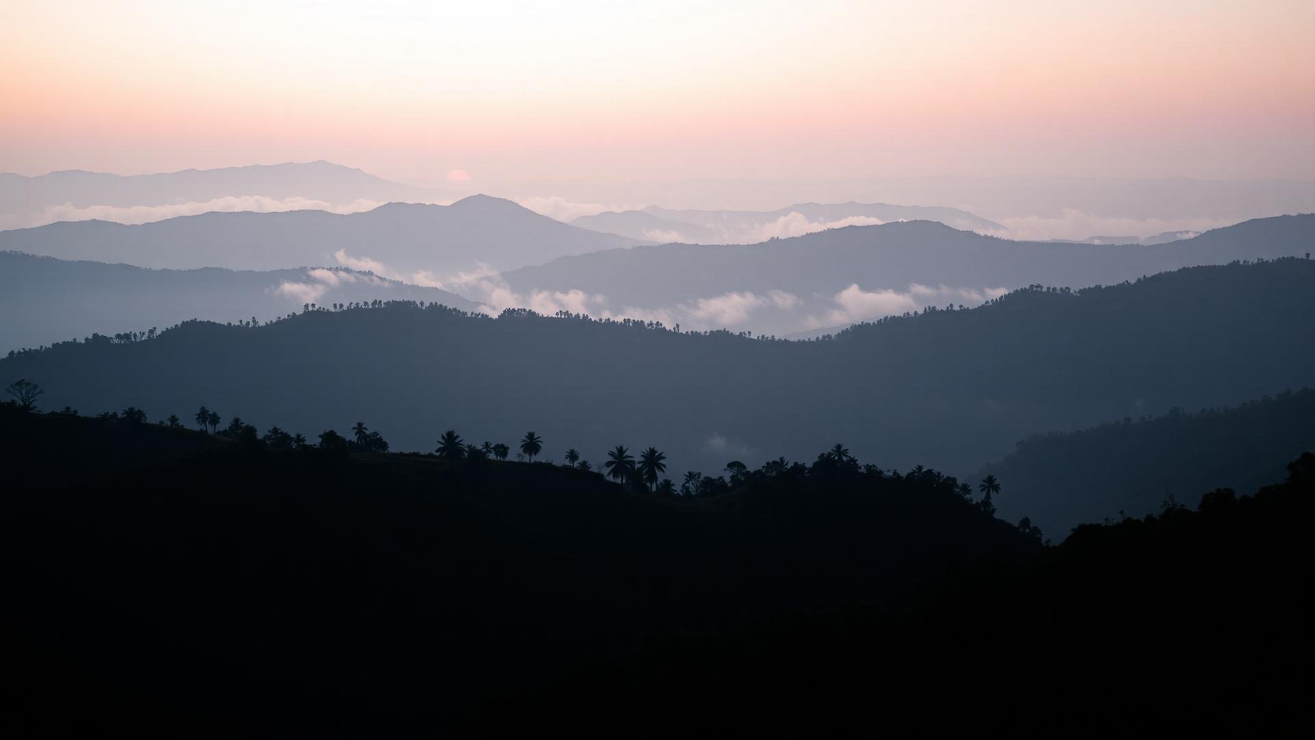 Mist rolling over the Western Ghats at dawn, near Coimbatore